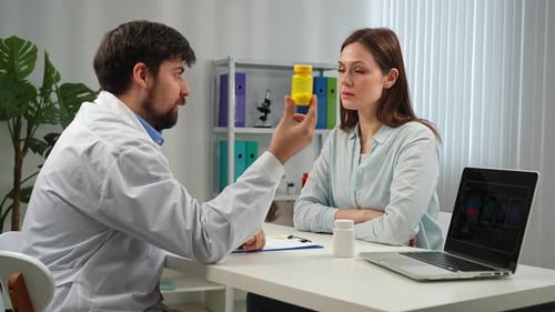 Doctor and Patient Discussing Medical Diagnosis in Office