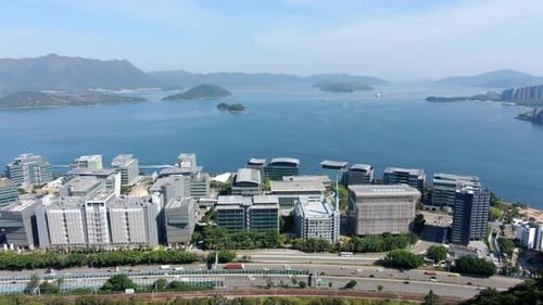 Parque Científico de Hong Kong con auditorio Charles K. Kao, edificio de forma única, vista aérea