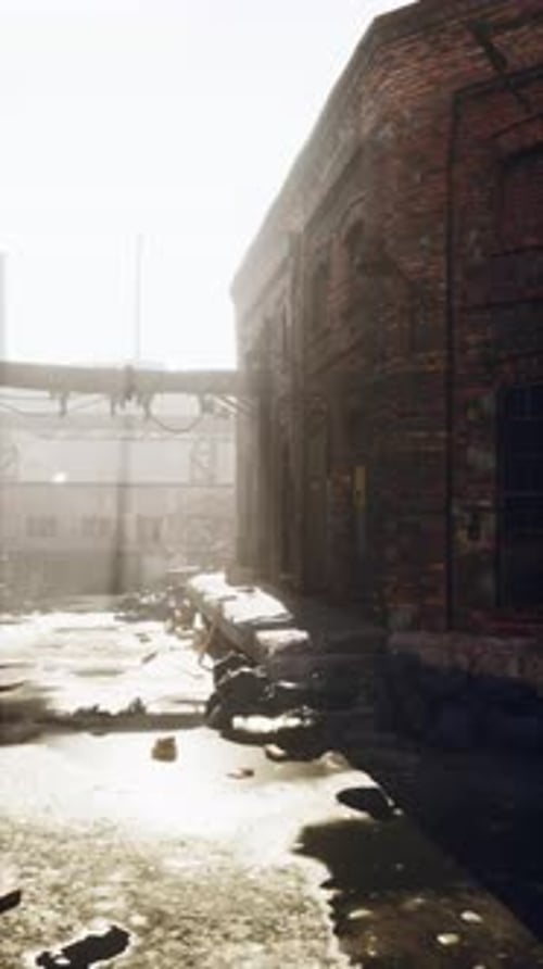 Sunlight Pierces Abandoned Factory at Dawn Vertical