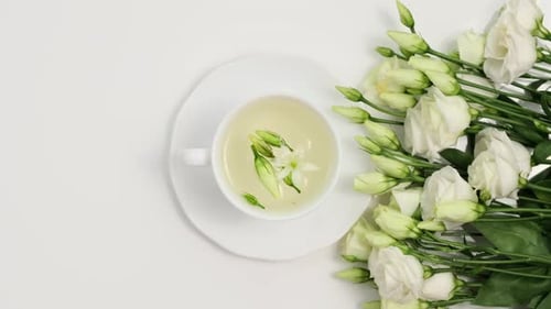 Delicate Flower Tea with White Eustoma Bouquet