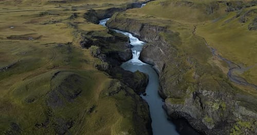 Picturesque Southeast Iceland Landscape of a river and waterfall in Summer - Aerial