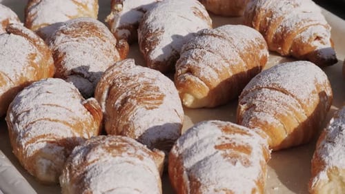 Close Up Taking Out Tasty Golden Croissants in French Spanish Bakery Traditional France Cuisine