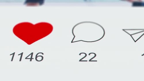 Reacting on Post in Social Network App on a Phone or Laptop Screen Like Comment and Share Repost