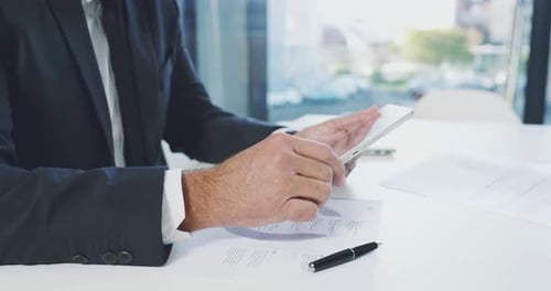 4k video footage of an unrecognizable businessman using a tablet in his office