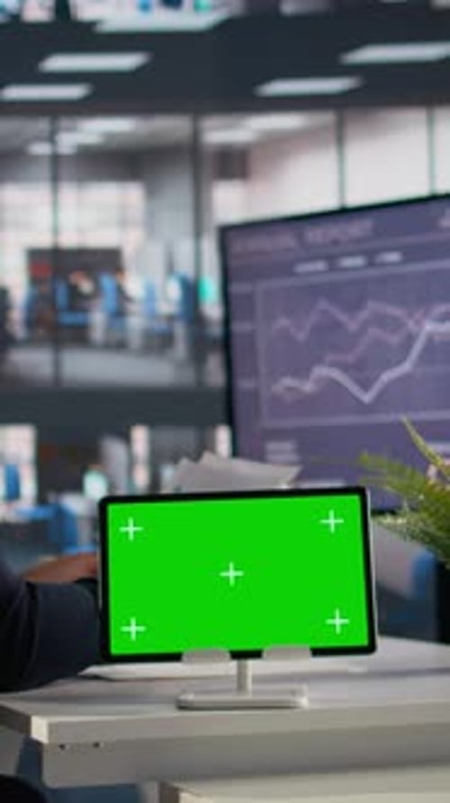 Vertical Video Isolated Screen on Tablet with CEO Reviewing Company Data and Insights