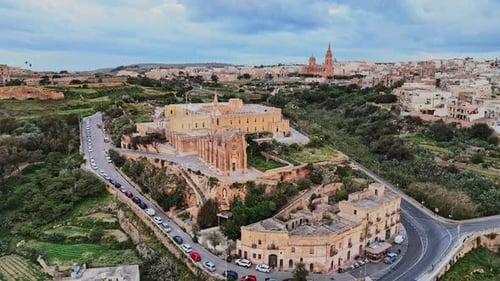 Aerial view of Malta showcasing historic architecture and lush landscapes
