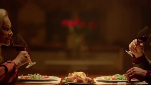 Old Couple Hands Clinking Wine Glasses Romantic Dinner in Restaurant. Closeup Mature