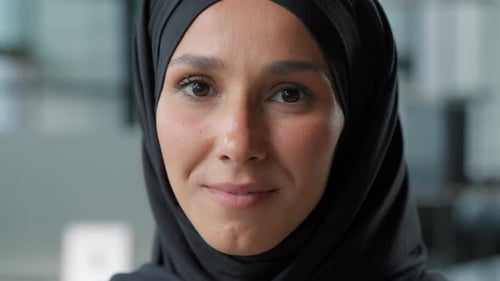Portrait in Office Happy Arabian Business Woman in Hijab Looking at Camera Smiling Toothy Muslim