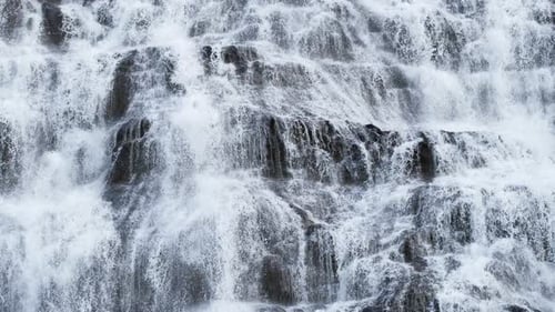 Water Stream Running Through Stone Boulders Mountain River Huge Icelandic Waterfall in Slow Motion