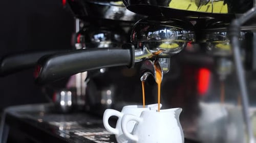 Preparation of Double Espresso in a Cafe Closeup