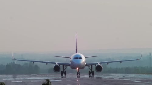 Airplane moving on the runway preparing for take off. Airplane taxi on runway.