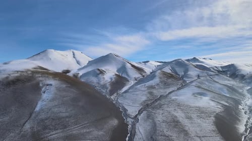 aerial snowy mountain hill