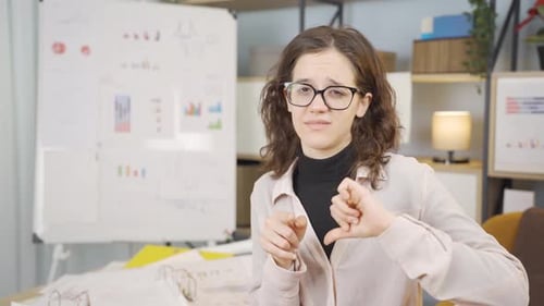 Young Woman Presenting Information Indoors