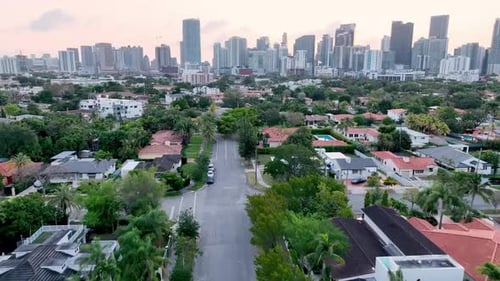 aerial push in over miami florida homes