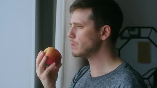 Man Eat Apple