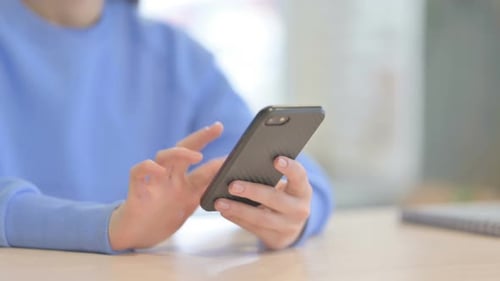 Close up of Woman Browsing Smartphone