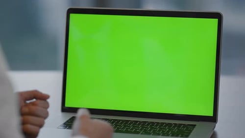 Unknown Manager Working on Chroma Key Laptop Conducting Business Video Conference At