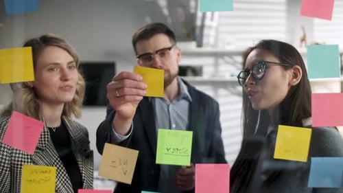 Collaborative Team Brainstorming Ideas in a Modern Workplace