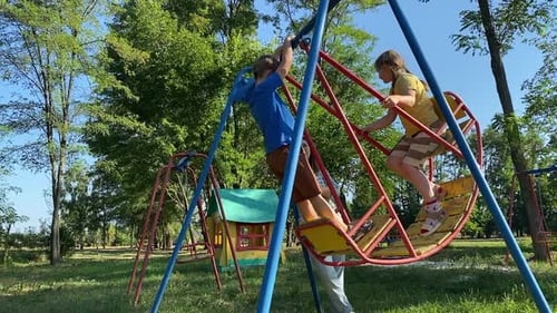 Mother and Kids Enjoy Funfilled Day at the Playground Summer Bonding