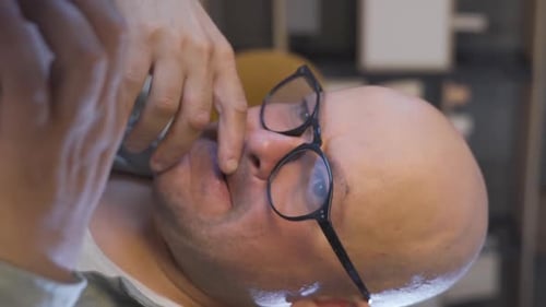 Adult Using Laptop at Home Close Up