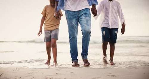 Holding hands, legs of family at ocean together for holiday and bonding on tropical adventure