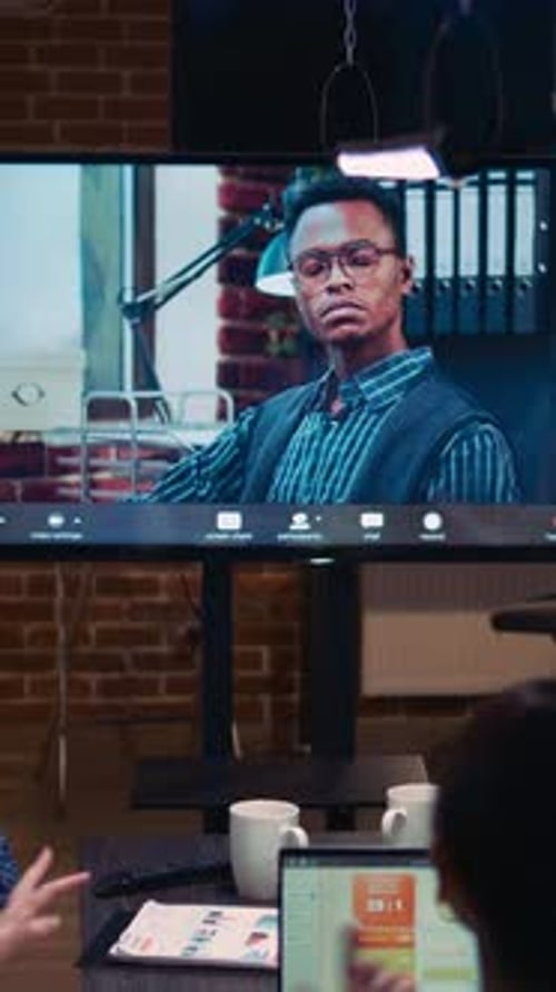 Business Meeting with Remote Connection in Modern Office