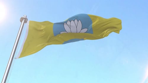 Realistic Waving Flag with Lotus Flower Symbol against Blue Sky