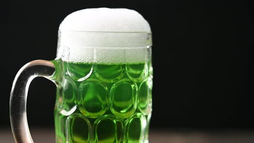 Green beer mug with foam for St. Patrick’s Day