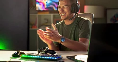 Man Plays Video Games, Reacts with Excitement
