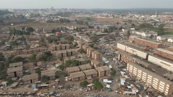 Aerial footage of a crowded and busy, Mbare Musika, and Matapi flats ...