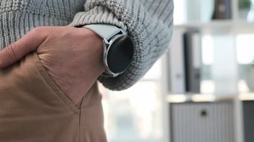 Close Up of Hand in Pocket Wearing Watch
