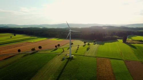 Aerial View of Wind Turbine in Rural Landscape
