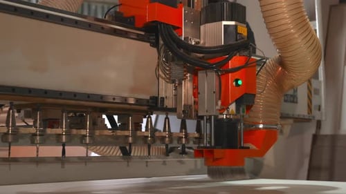Automated Tool Swapping System Efficiently Manages Router Bits During Rapid Panel Manufacturing