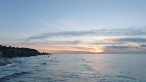Aerial cinematic view of abandoned seaside fortification buildings at Karosta Northern Forts on the