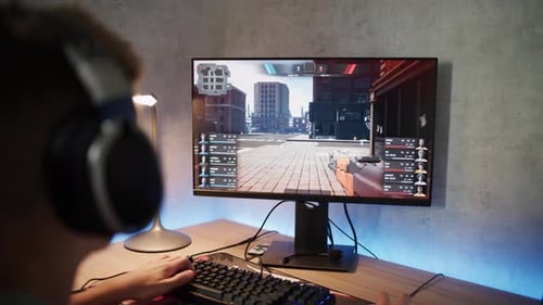 Young Adult Plays First Person Shooter