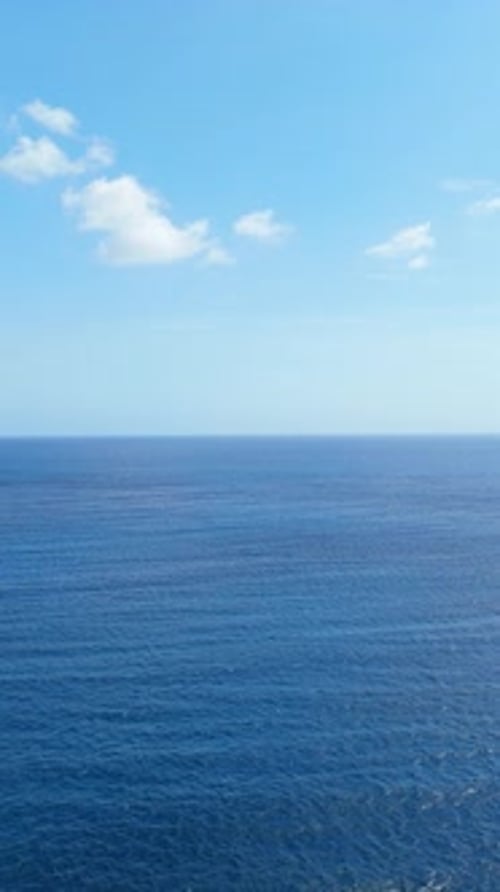 Vertical drone shot of ocean landscape
