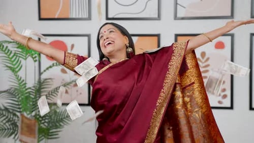 Woman Throws Money Up in the Air Joyfully