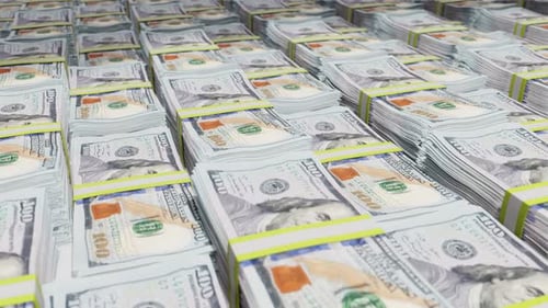 Stacks of Hundred Dollar Bills Panning Across Frame