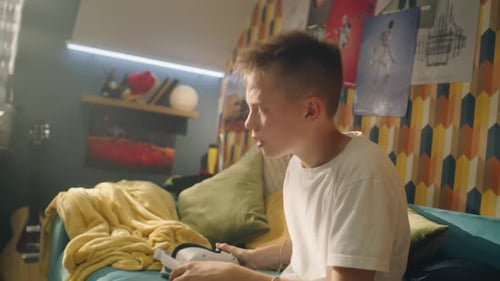 Teenager Takes Off Virtual Reality Headset at Home