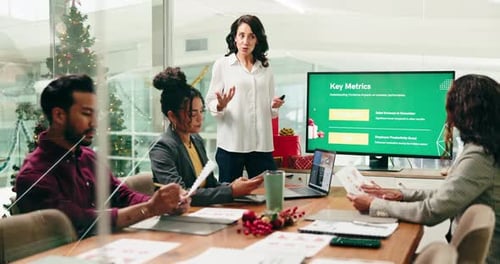 Office, presentation and woman with business people in meeting for Christmas charity event
