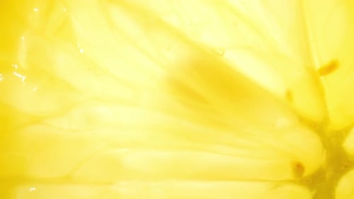 Close Up of Lemon Section with Translucent Light