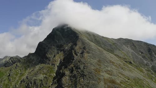 Impressive Aerial Krivan Summit Slope and Ridge on Sunny Cloudy Day, High Tatras