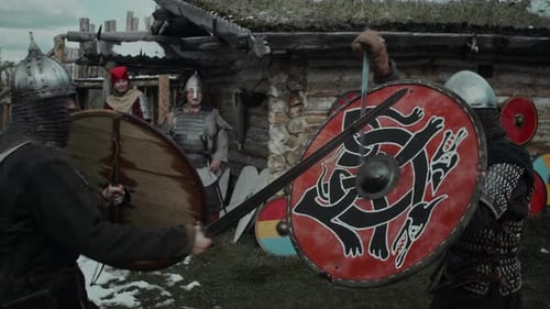 Warriors Practicing with Swords and Shields in Medieval Village Fort