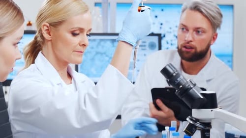 Scientists Working in Modern Medical Research Laboratory