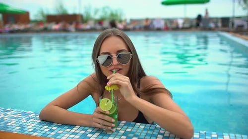 Beach Bikini Woman Summer Relax at Swimming Pool with Tropical Cocktail Holiday Vacation Travel