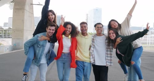 Group of Diverse Young Friends Enjoying and Laughing in a City