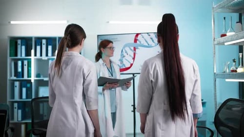 Scientists Meeting About DNA in Modern Lab