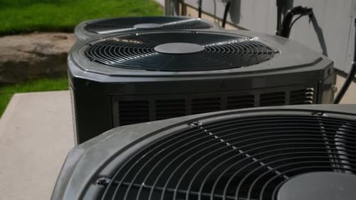 Air Conditioning Units Outside on Sunny Day