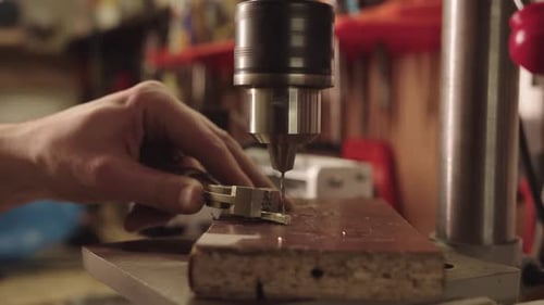 Automated Drill Press Making Metal Part