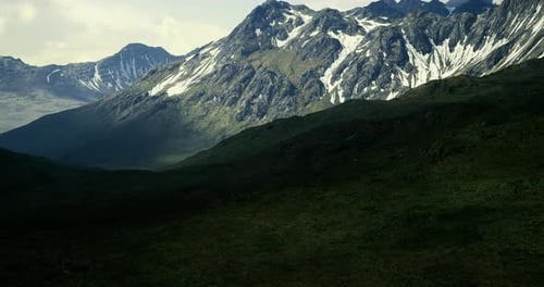 Majestic Mountains Rise Above Lush Valleys in a Scenic Landscape